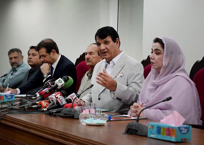 Federal Minister for Kashmir Affairs and Gilgit-Baltistan Engineer Amir Muqam addresses a press conference at the Kashmir Council.
