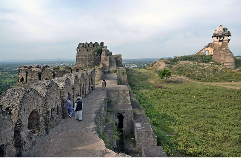 Rohtas Fort is a 16th-century fortress near Dina and Jhelum in Punjab, Pakistan. It was built in 1541 by Sher Shah Suri as a massive military stronghold and was designated a UNESCO World Heritage Site in 1997. Rohtas Fort is situated on a hill in the Tilla Jogian Range, overlooking a gorge where the Kahān River meets a seasonal stream called Parnal Khas. The fort is positioned 91.5 metres (300 ft) above its surroundings. It is 819 metres (2,687 ft) above sea level and covers an area of 70 hectares (170 acres). It is approximately 103 kilometers (64 miles) from Islamabad and is renowned for its historical significance and architectural marvels. Visitors can enjoy a guided tour that includes exploring the fort's monumental gates, palaces, barracks, and mosques