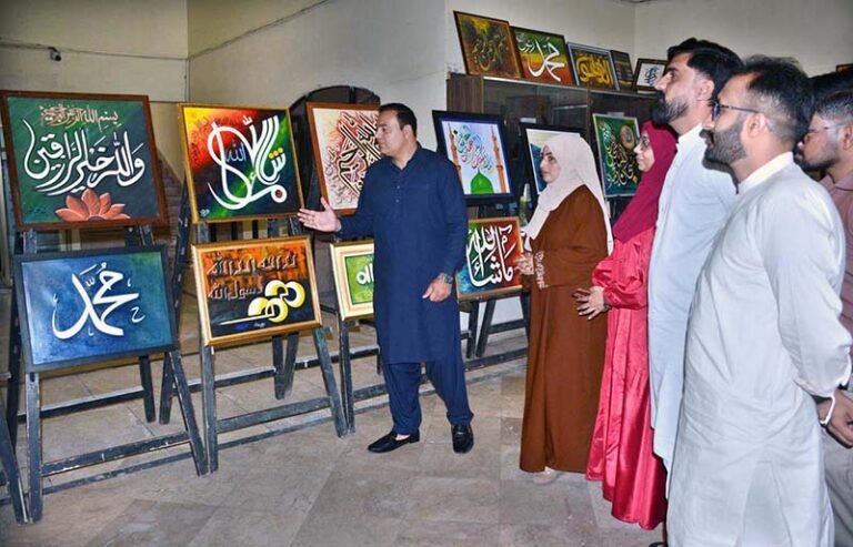 Visitors take a keen interest in artworks displayed at the 21st Annual Quranic Calligraphy Exhibition at the Arts Council