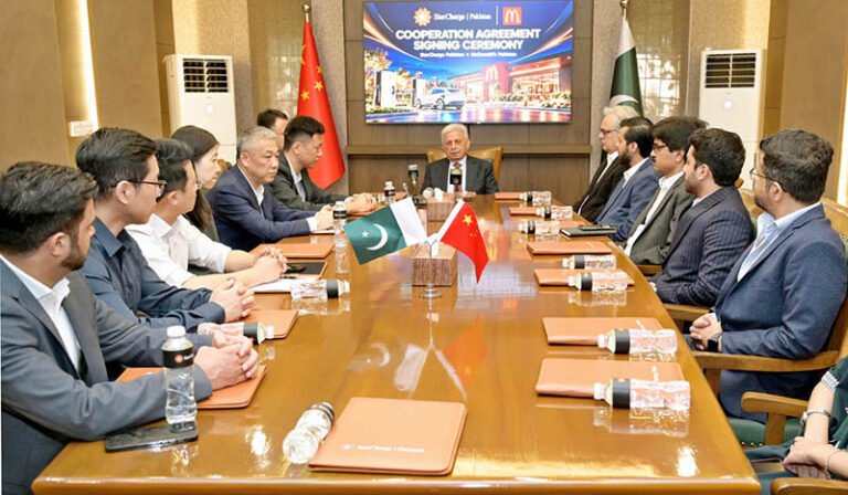 Federal Minister for National Food Security and Research Rana Tanveer Hussain addresses a ceremony marking the signing of an MoU between Star Charge and McDonald’s