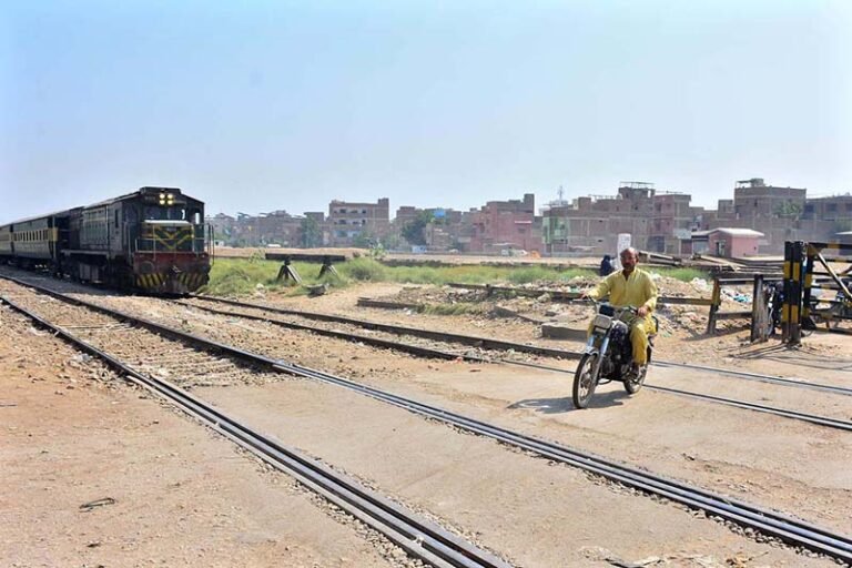 A motorcyclist crossing the railway tracks near the railway station while a train is approaching may cause a mishap and needs the attention of the concerned authorities