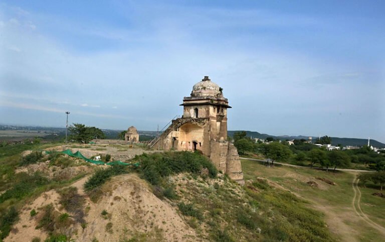Rohtas Fort is a 16th-century fortress near Dina and Jhelum in Punjab, Pakistan. It was built in 1541 by Sher Shah Suri as a massive military stronghold and was designated a UNESCO World Heritage Site in 1997. Rohtas Fort is situated on a hill in the Tilla Jogian Range, overlooking a gorge where the Kahān River meets a seasonal stream called Parnal Khas. The fort is positioned 91.5 metres (300 ft) above its surroundings. It is 819 metres (2,687 ft) above sea level and covers an area of 70 hectares (170 acres). It is approximately 103 kilometers (64 miles) from Islamabad and is renowned for its historical significance and architectural marvels. Visitors can enjoy a guided tour that includes exploring the fort’s monumental gates, palaces, barracks, and mosques