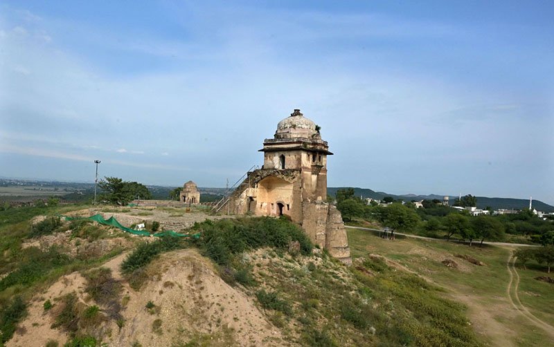 Rohtas Fort is a 16th-century fortress near Dina and Jhelum in Punjab, Pakistan. It was built in 1541 by Sher Shah Suri as a massive military stronghold and was designated a UNESCO World Heritage Site in 1997. Rohtas Fort is situated on a hill in the Tilla Jogian Range, overlooking a gorge where the Kahān River meets a seasonal stream called Parnal Khas. The fort is positioned 91.5 metres (300 ft) above its surroundings. It is 819 metres (2,687 ft) above sea level and covers an area of 70 hectares (170 acres). It is approximately 103 kilometers (64 miles) from Islamabad and is renowned for its historical significance and architectural marvels. Visitors can enjoy a guided tour that includes exploring the fort's monumental gates, palaces, barracks, and mosques