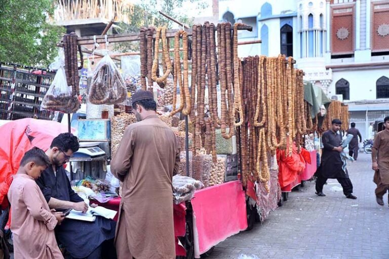 Vendors displaying dry fruits to attract the customers at Tower Market.