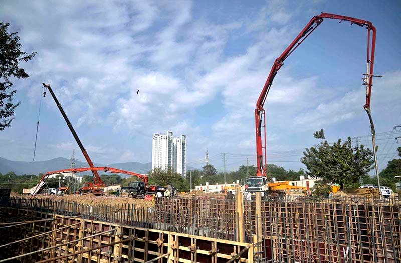 Heavy machinery being used for the construction work of Kashmir Chowk underpass during development work in Federal Capital.