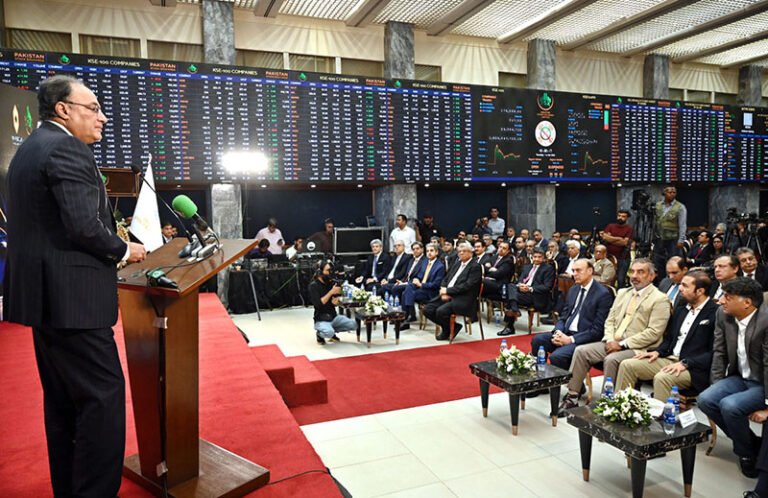 Federal Minister for Finance and Revenue Senator Muhammad Aurangzeb addresses the audience during the gong ceremony marking the listing of NAYA Nazimabad Apartment REIT at the Pakistan Stock Exchange (PSX)