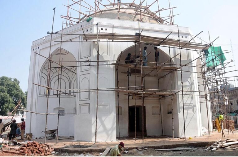 Workers are busy carrying out maintenance work on the historic blue dome.