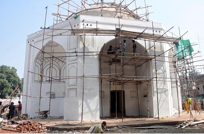 Workers are busy carrying out maintenance work on the historic blue dome.