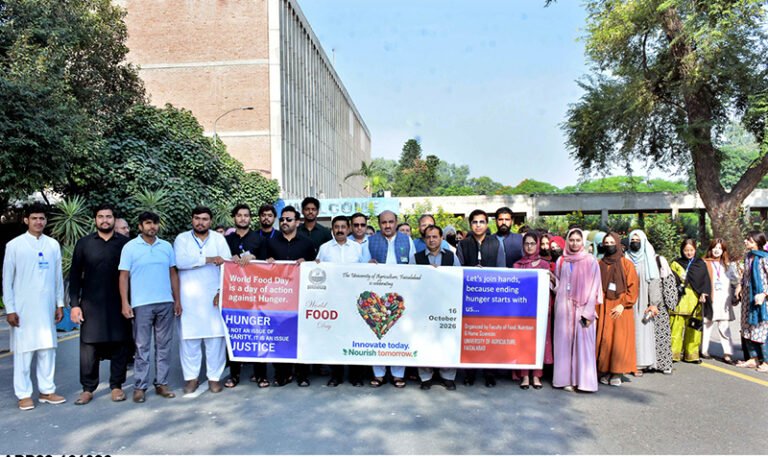 Faculty members and students of the University of Agriculture Faisalabad participate in a walk to mark World Food Day, organized by the National Institute of Food Science and Technology (NIFSAT), Faculty of Food, Nutrition and Home Sciences University of Agriculture Faisalabad (UAF)-