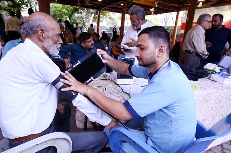 Karachi Press Club members undergo medical screening at a special Cardiac and Pulmonary Health Camp organized by Aga Khan University Hospital in collaboration with the KPC Health Committee