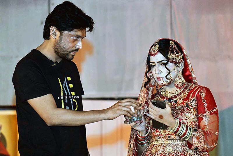 Artists perform in the drama Piyar Darya Hai at Z.A. Bhutto Open Air Theatre, Arts Council.