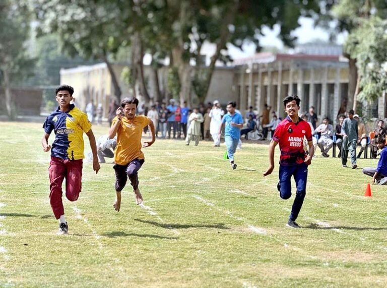 Students participate in 200 meters race during Inter School Athletics organized by Sports and Youth Affairs Department Government of Sindh at Tando Adam Cricket Stadium