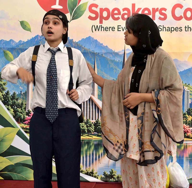 Students perform in skits on stage during an event, "Community Voice to COP31: From Negotiations to Implementation," organized by the Pakistan Red Crescent Society