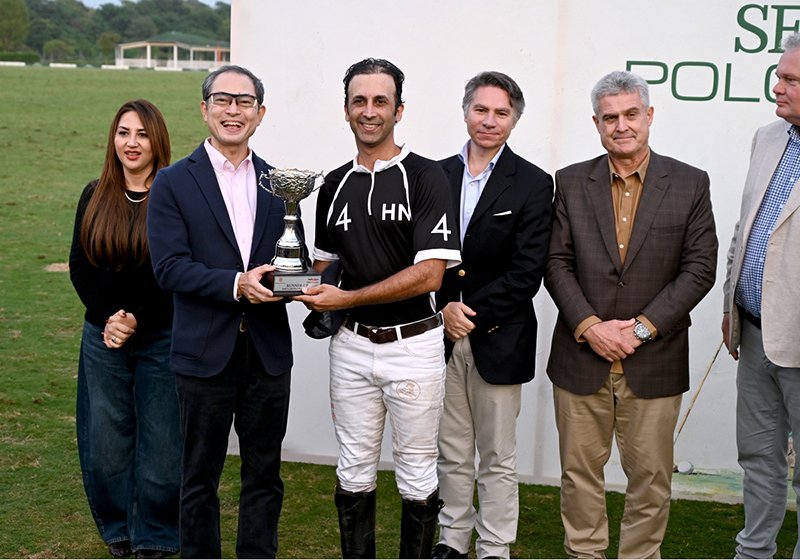 Ambassador of Japan to Pakistan H.E. Mr. Akamatsu Shuichi presents the runner-up trophy to the Team HN captain after the final match of the Serena Polo Cup 2026 between Team HN and Team ASEAN at the Islamabad Club Polo Ground