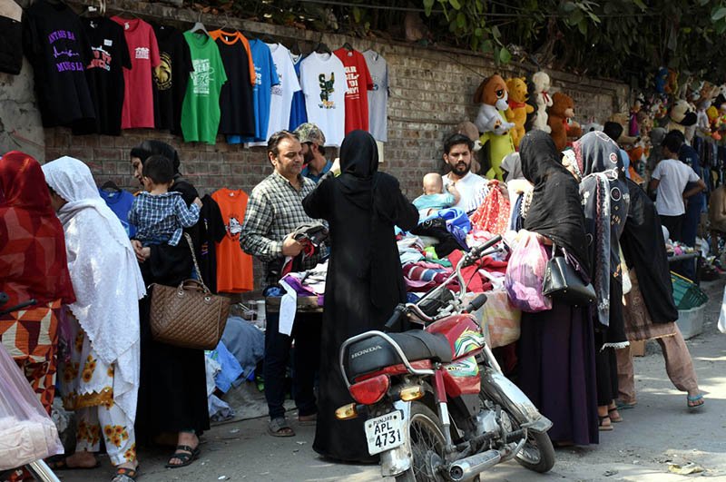Families are busy buying old clothes at Landa Bazaar