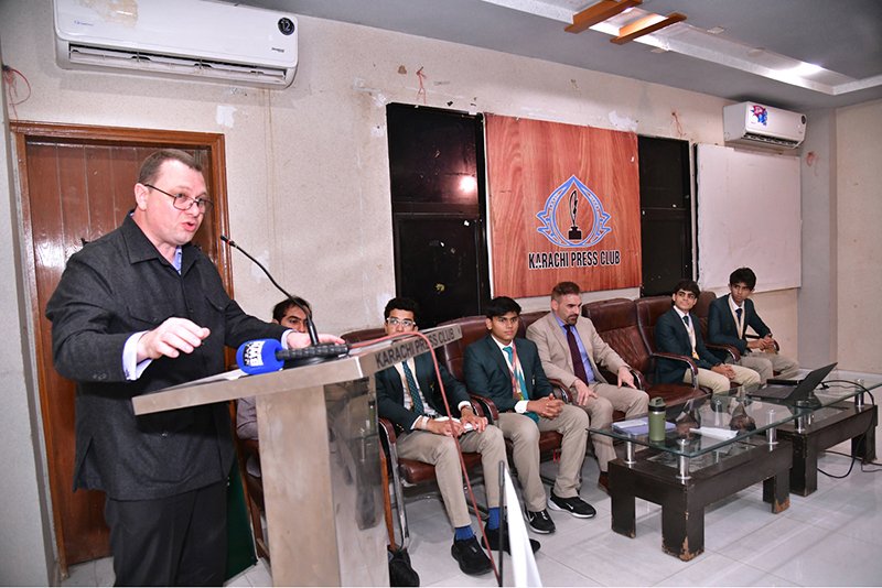 Russian Consul General Andrey Viktorovich Fedorov addresses an event to acknowledge Karachi Grammar School students at Karachi Press Club