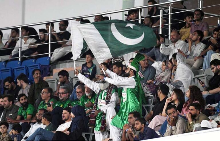 Spectators enjoy the second T20 international cricket match between Pakistan and Sri Lanka at Rawalpindi Cricket Stadium
