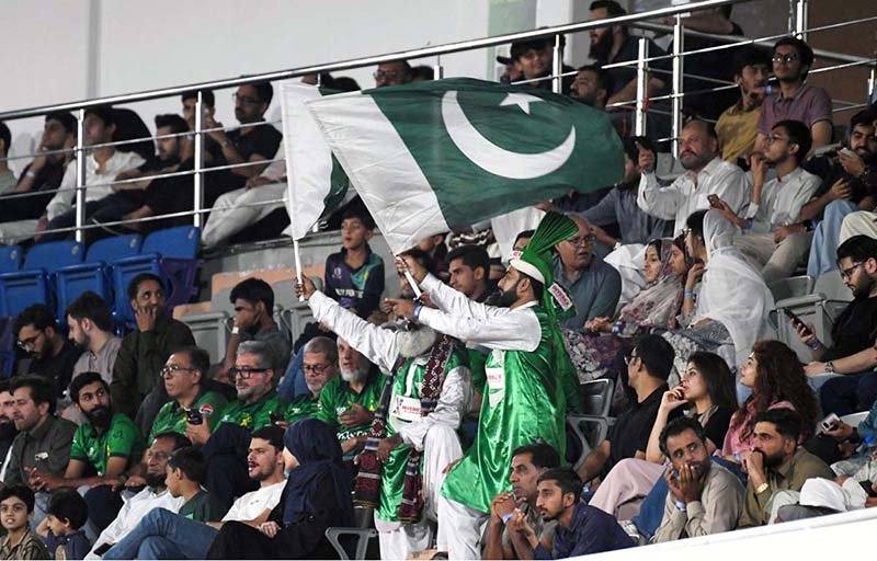 Spectators enjoy the second T20 international cricket match between Pakistan and Sri Lanka at Rawalpindi Cricket Stadium