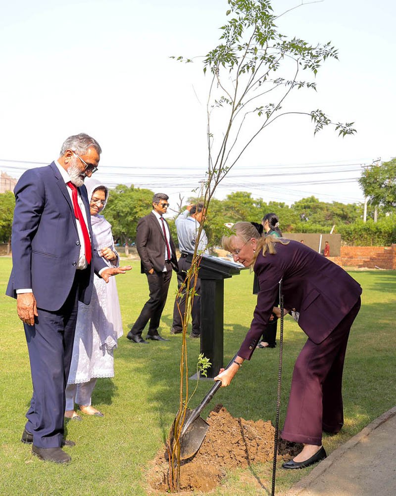 German Ambassador to Pakistan is Ina Lepel sapling plant during visit The University of Faisalabad (TUF)