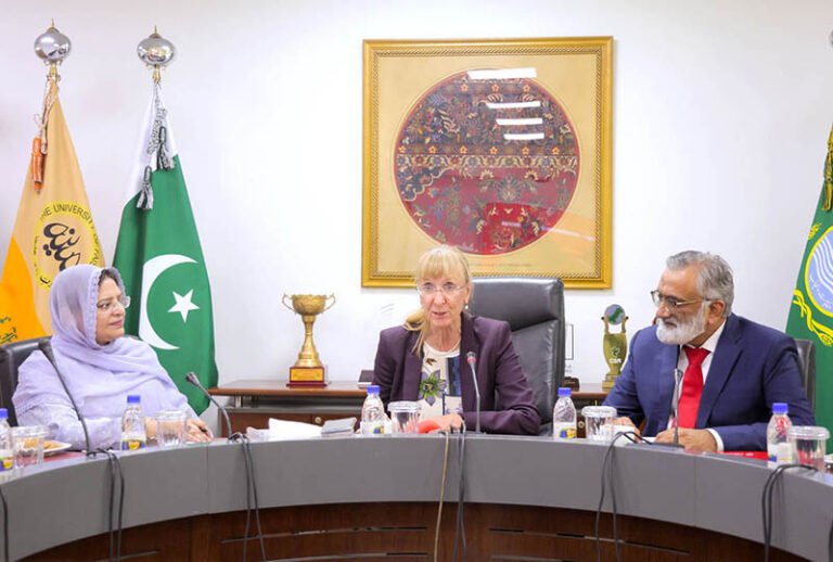 German Ambassador to Pakistan Ina Lepel is addressing a meeting with faculty members during visit The University of Faisalabad