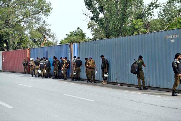 Security officials place containers in Islamabad’s Red Zone, which houses most embassies and government offices, following the imposition of an emergency and governor’s rule in Khyber Pakhtunkhwa, approved by President Asif Ali Zardari, amid heightened tensions between the federal government and the PTI-led provincial administration during the party’s ongoing protest campaign