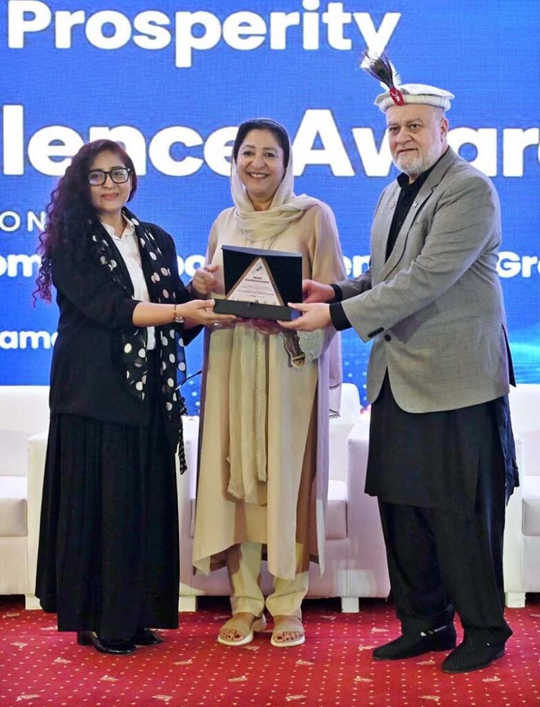 Federal Minister for Poverty Alleviation and Social Safety, Syed Imran Ahmed Shah presenting media excellence award to participant during International Conference on "Inclusive and Resilient Economic Empowerment and Growth" organized by Pakistan Poverty Alleviation Fund (PPAF) at local hotel
