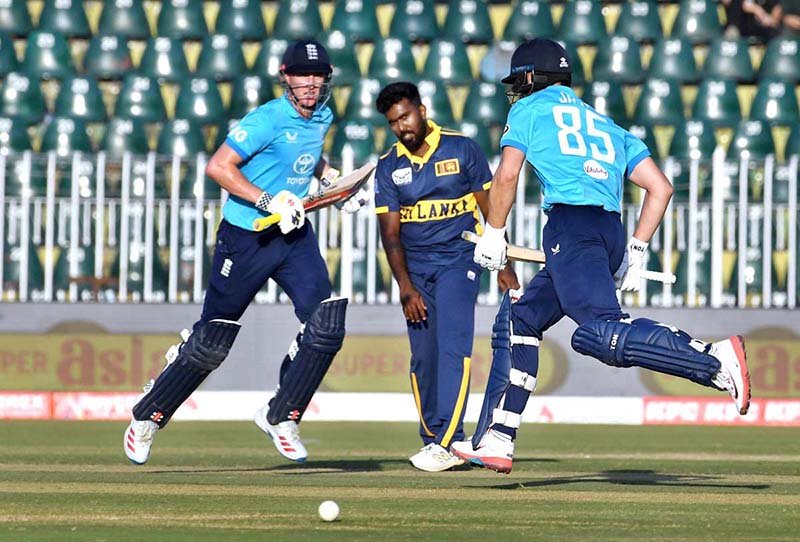 Harry Brook and Will Jacks of England run during game three of the One Day International Tri-Nation Series playing between Sri Lanka and England at Rawalpindi Cricket Stadium