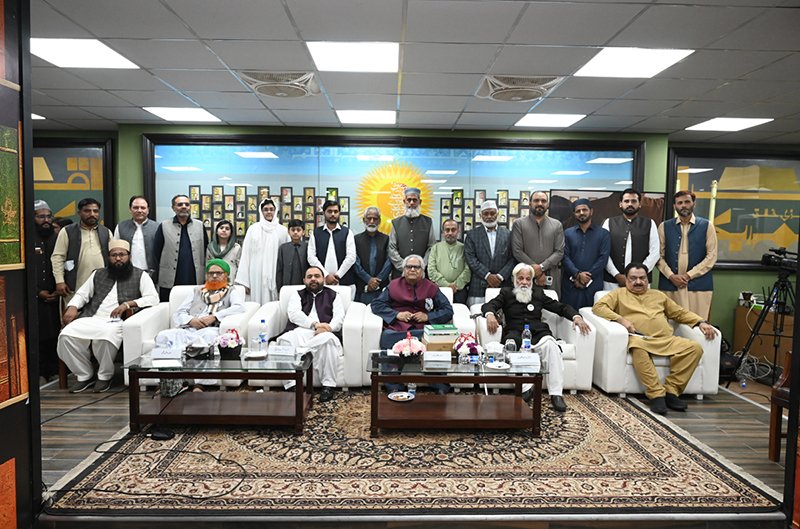 Federal Minister for National Heritage & Culture Division, Aurangzeb Khan Khichi, in a group photo with the participants of "Naatia Mushaira" organized with the collaboration of Al-Zawiya Al-Jazuliyah Pakistan and Punjabi Adab Council at Pakistan Academy of Letters