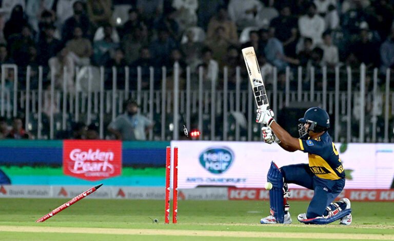 Sri Lankan batter Dunith Wellalage is bowled out during the T20 cricket match between Pakistan and Sri Lanka at Rawalpindi Cricket Stadium.
