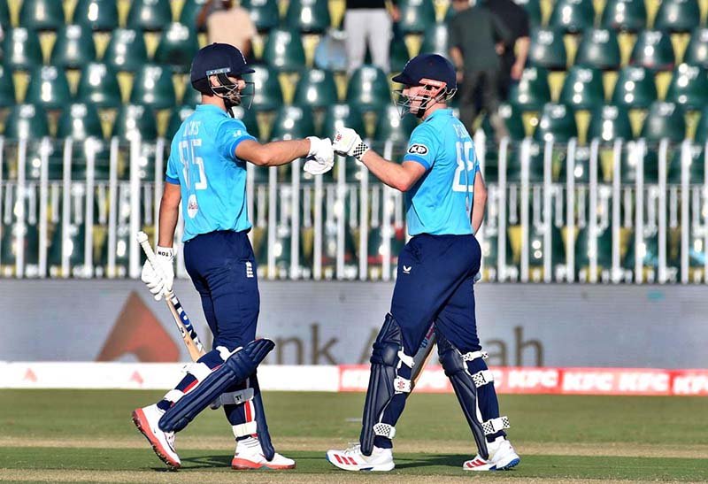 England's Harry Brook celebrates after scoring century during the tri-nation series one-day international cricket match between Sri Lanka and England in Rawalpindi Cricket Stadium