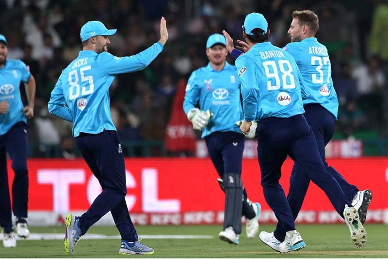 England players celebrated the Pakistani batsman wicket (Babar Azam bowled by Gus Atkinson )during the one-day international (ODI) tri-series cricket match between England and Pakistan at the Gaddafi Cricket stadium