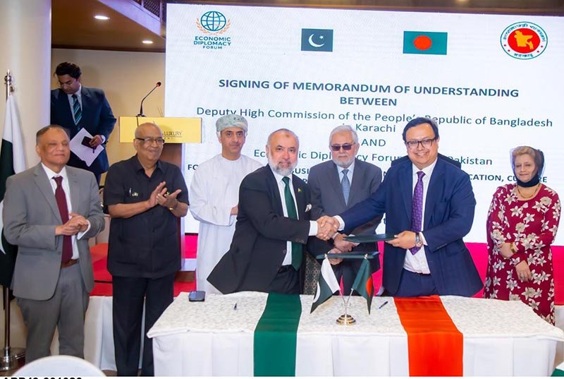 Deputy High Commissioner of Bangladesh Muhammad Sakib Sadakat and Founder President of the Economic Diplomacy Forum (EDF) Dr. Muhammad Farooq Afzal exchange the signed documents of a memorandum of understanding (MoU) to strengthen bilateral economic cooperation.