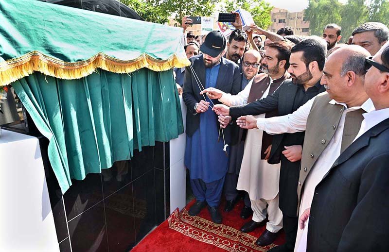 Federal Minister for Overseas Pakistanis & Human Resource Development Chaudhry Salik Hussain and Minister of State (Law & Justice) Barrister Aqeel Malik unveiling a plaque during the foundation stone-laying ceremony of the Labour Complex Phase-II