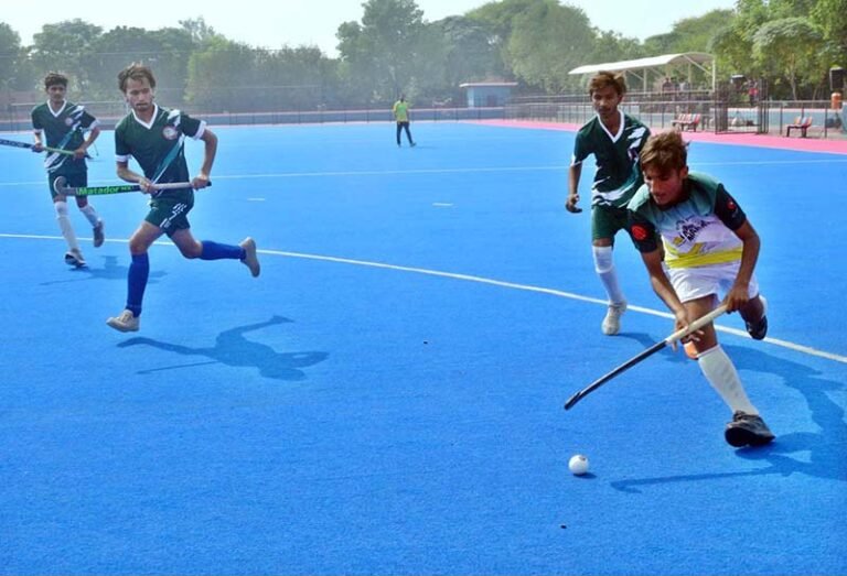 Players in action during an Inter-Collegiate Boys’ Hockey Tournament match at the Astroturf Hockey Stadium, Mela Mandi