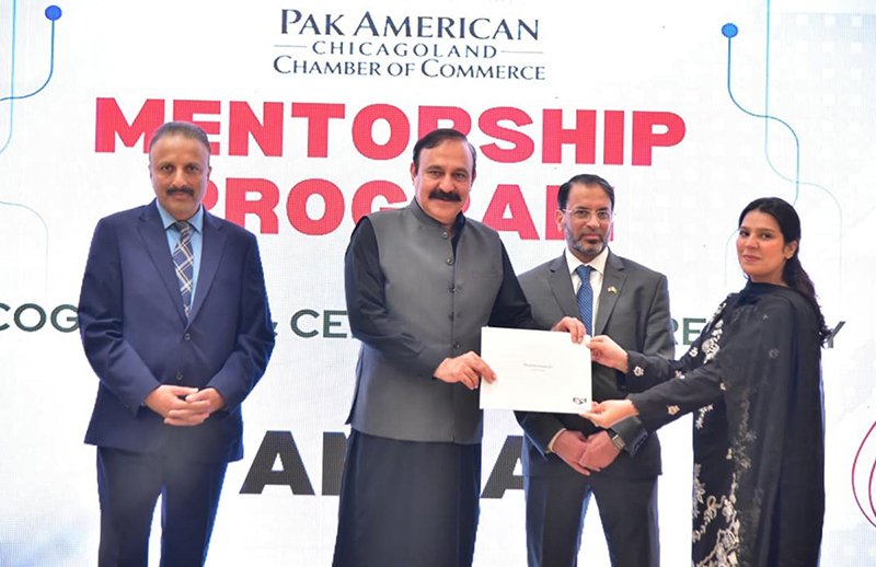 Federal Minister for Parliamentary Affairs Dr. Tariq Fazal Chaudhary distribute awards and certificates in an event organised by Pakistan American Chicagoland Chamber of Commerce.