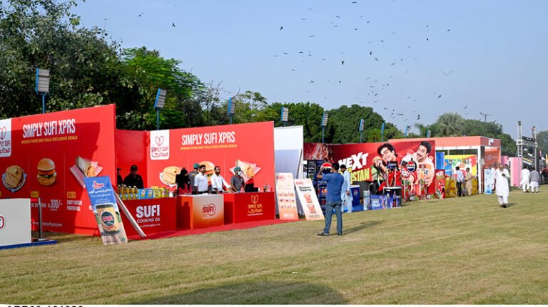 Various companies showcase their products at stalls during a food festival marking World Food Day at Racecourse Park.