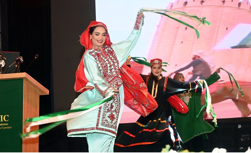 Artists perform a traditional dance during the launch ceremony of the China-Pakistan Information Corridor (CPIC) at the Pakistan-China Friendship Centre