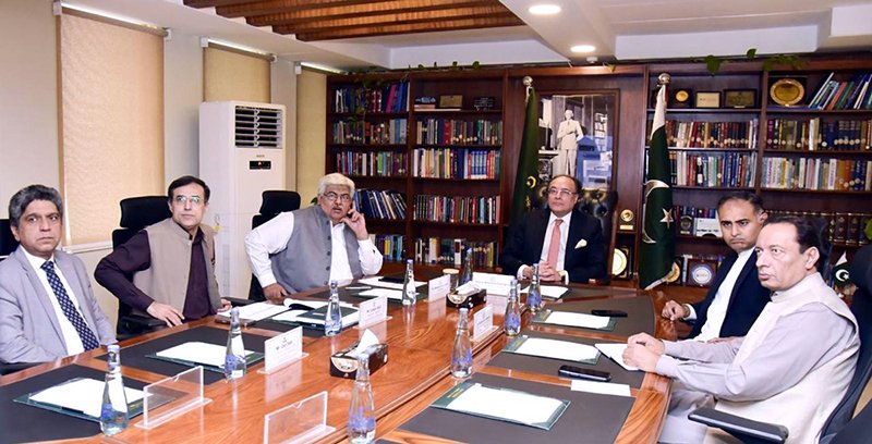 Federal Minister for Finance and Revenue, Senator Muhammad Aurangzeb, chairing a meeting at the Finance Division to review progress on the retailers’ tax scheme at the Finance Division.