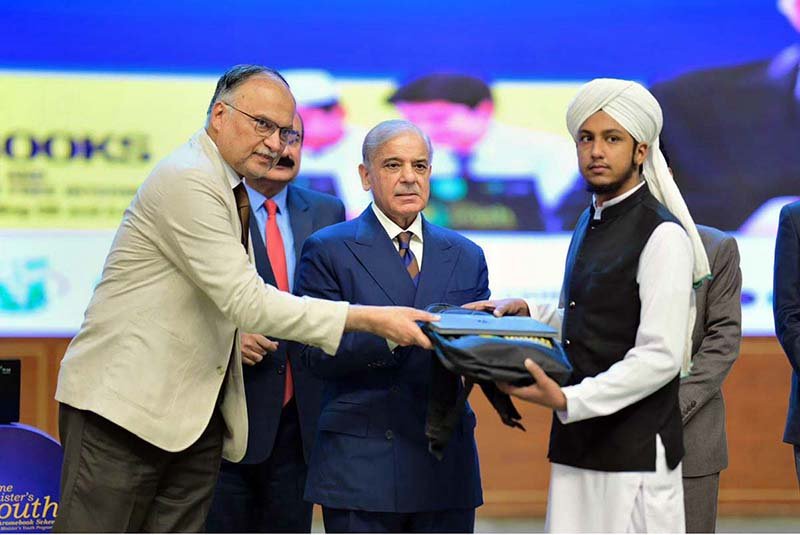 Prime Minister Muhammad Shehbaz Sharif hands over Chromebooks and Mifi devices to brilliant students from Madrassas and schools