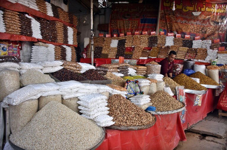 Vendors waiting for customers selling different kinds of dry fruits on the roadside setup in the Provincial Capital