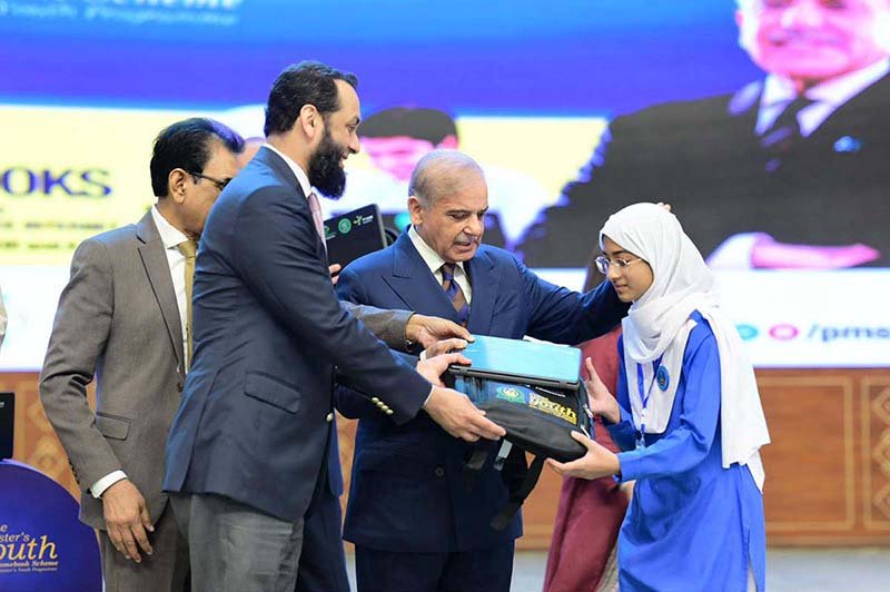 Prime Minister Muhammad Shehbaz Sharif hands over Chromebooks and Mifi devices to brilliant students from Madrassas and schools