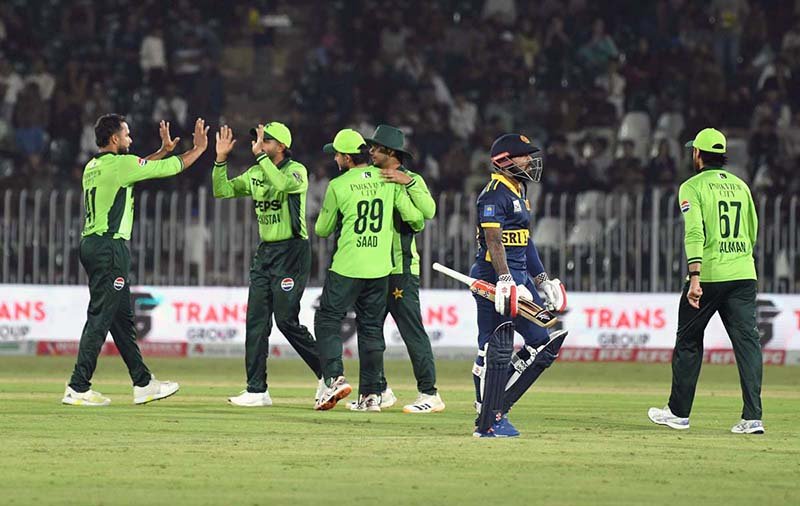 Pakistani players celebrate after taking a wicket Sri Lankan Kusal Mendis during the Tri-Nation Series cricket match between Pakistan and Sri Lanka at Rawalpindi Cricket Stadium