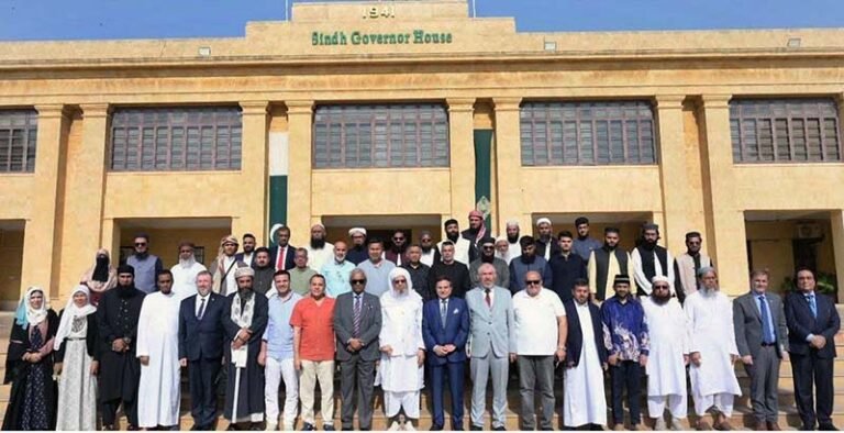 Sindh Governor Syed Muhammad Nihal Hashmi poses for a group photograph with chancellors, vice-chancellors, rectors and other international educationists representing universities from 34 Muslim countries at Governor House