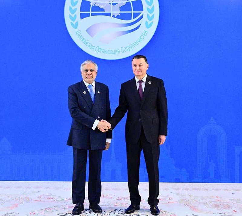 Deputy Prime Minister/Foreign Minister Senator Mohammad Ishaq Dar shaking hands with the Prime Minister of Tajikistan, H.E. Mr. Qohir Rasulzoda, ahead of the 25th meeting of the SCO Council of Heads of Government (CHG)