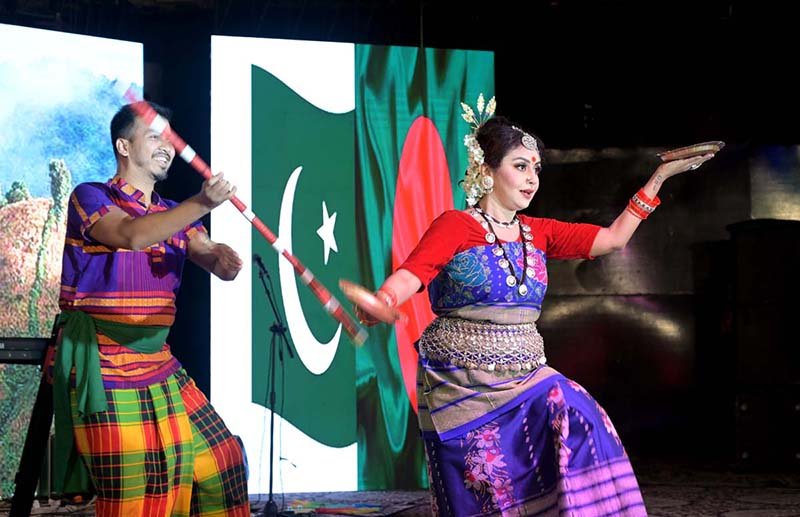 Artists from Bangladesh perform during a special cultural evening at the Open Air Theatre Lok Virsa